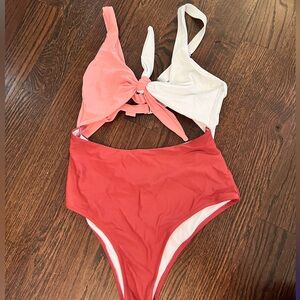 Never worn one piece swimsuit